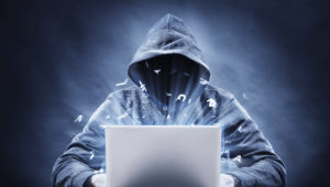 hacker using laptop