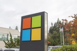 Microsoft logo outside of building.