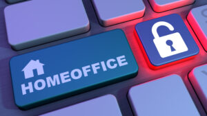 A button on a keyboard that says "home office" next to a button with a padlock symbol on it.