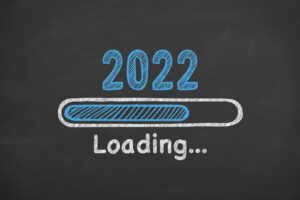 A loading bar on a chalkboard that says 2022 over it.