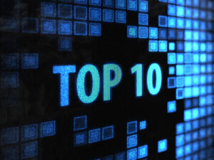 "Top 10" displayed in blue on a black screen, surrounded by blue pixels.