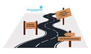 An illustration of a winding road with signs that say "New technologies ahead," "economic slowdown." and "Caution: Cybersecurity threats ahead," representing an IT roadmap.